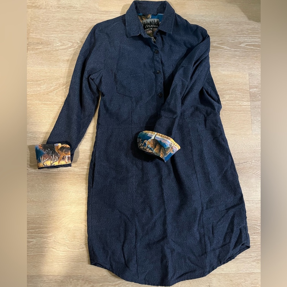 Navy Pladra flannel dress with deer on inside cuff and collar.